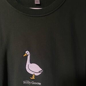 Size medium
Green is a dark forest green color 
Never been worn BRAND NEW